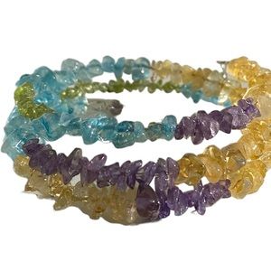 Handcrafted wrap bracelet with amethyst, citrine, peridot and aquamarine.